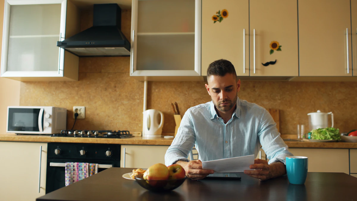 Customer at his kitchen table reading a junk removal bill
